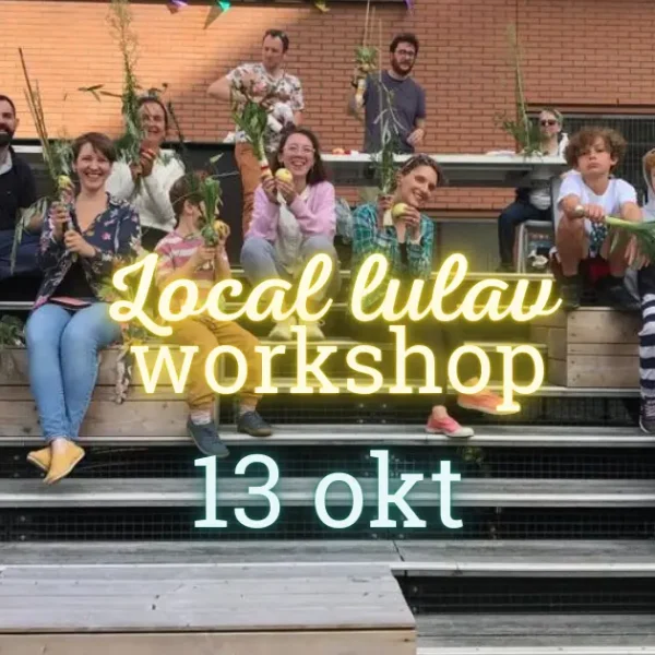 Group of smiling people sitting on steps showing off their local lulavs