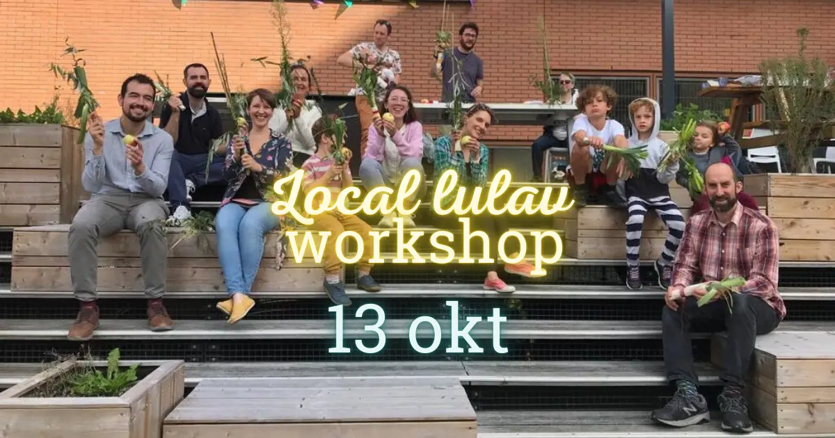 Group of smiling people sitting on steps showing off their local lulavs