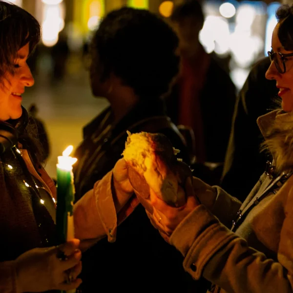 Sharing challah on Dam Square in Amsterdam.