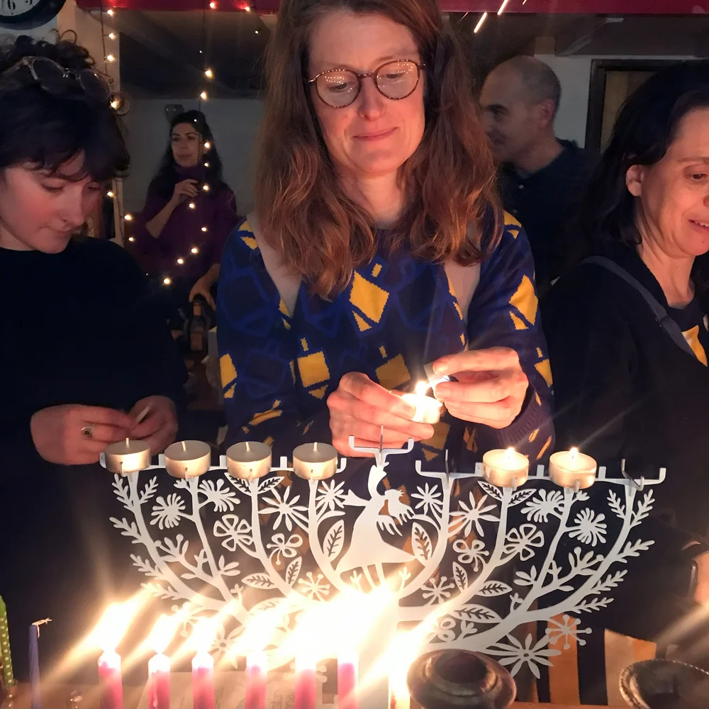 Lighting the channukah menorah