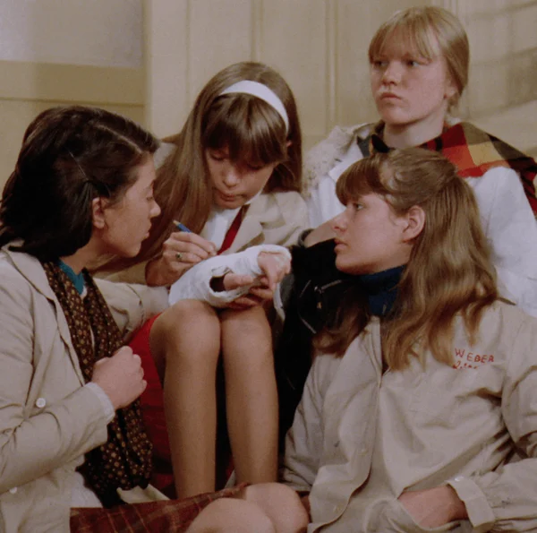 4 girls on a staircase in film Peppermint Soda by Diane Kurys
